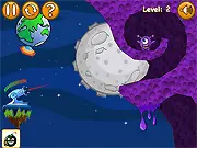 Screenshot of the Space Monsters game showing a launched bomb rolling towards a cluster of small, alien-like monsters on a gravity-affected platform