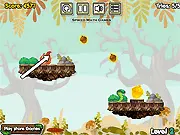 Squirrel and the Golden Nut free online arcade game, launching squirrel to collect golden nut, avoiding snakes