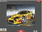 Screenshot of the Honda Jigsaw Puzzle game showing fragmented pieces of a shiny red Honda car waiting to be assembled.