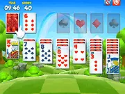Solitaire Lands online card game free, featuring TriPeaks gameplay on a scenic landscape background, play on PlayArcadeHub