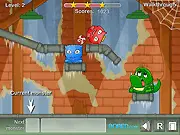 Dusty Monsters game screenshot showing a monster waiting for candy and a character shaped like a block on a platform