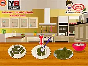 Screenshot of the Turkish Stuffed Grape Leaves cooking game showing rolled grape leaves and fresh ingredients
