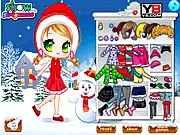 Heap a Big Snowman Dress Up game screenshot - Girl in winter clothes next to a snowman
