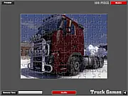 Winter Truck Jigsaw Puzzle game screen showing scrambled pieces of an image featuring a large snow truck in a winter landscape, play free online puzzle game