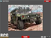 Screenshot from the Hummer Jigsaw Puzzle game showing a fragmented picture of a tough, yellow Hummer SUV waiting to be solved.