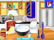 Screenshot of Bake Winter Cupcakes game showing a finished, decorated cupcake with winter-themed frosting and toppings