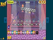 Screenshot of Tarzan Ball Puzzle free online physics game, character using a sticky arm to grab objects and reach the target