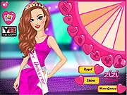 Designing the perfect night dress and crystal tiara for a contestant in the free online Miss Universe Fashion Show game