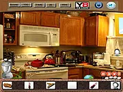 Kitchen Hidden Object Search game screen showing a messy kitchen scene with a list of items to find, play free online hidden object game