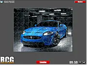 Play Jaguar Jigsaw free car puzzle game online on PlayArcadeHub, solving a hard mode jigsaw puzzle