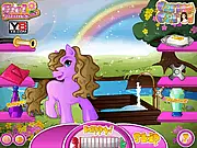Screenshot of Caring Carol Cute Pony game showing the fully groomed pony wearing a colorful saddle and bridle with a fashionable accessory. Play the free online dress-up game.