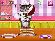 Tom Family Cooking Pancakes game showing Tom and his kittens decorating a stack of pancakes