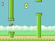 Screenshot from Flappy Bird Arcade free game showing the little yellow bird flying between two narrow green pipes
