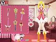The two fairy girl characters from Fairy Warrior Dressup, one holding a sword and the other a magic staff, wearing ornate armor and dresses