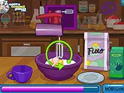 Dracula Cupcakes game screenshot showing a finished cupcake decorated with vampire fangs, red 'blood' icing, and a spooky theme