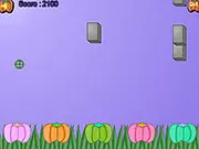 Stoned Pumpkins free online game, protect the pumpkins, falling stones avoidance game, play arcade hub