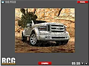 Ford Car Jigsaw game showing scattered pieces of a blue Ford Mustang car image, ready to be assembled