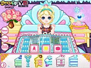 Screenshot of the game Baby Elsa's Patchwork Blanket, showing the custom-designed, colorful patchwork blanket and Baby Elsa wearing a cute pajama top.