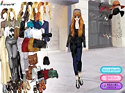 Screenshot of Autumn Street Style Dress Up game showing a model wearing a trendy jacket, a fringed bag, and a fashionable hat.