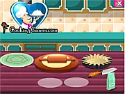 American Apple Pie Cooking Online free game screenshot showing a finished golden-brown apple pie on a cooling rack in a virtual kitchen
