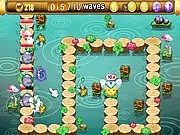 Screenshot of Flower Guardian game showing a lush green path with various colorful flower towers defending against cartoon monsters.