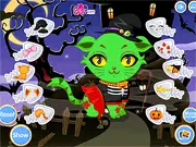 Screenshot of the Halloween Kitten Dressup online game, featuring an adorable cartoon cat wearing a spooky witch costume with a black hat and cape.