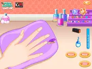 Anna Princess Nail Design free online game screenshot showing a hand with elaborate manicured nails and rings