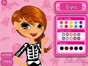 Screenshot of the free online game Halloween Hair Studio showing a girl with a wildly styled, brightly colored haircut and a spooky Halloween costume.