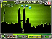 Ben 10 Bubble Trouble arcade game online, Ben 10 shooting and splitting balls, free action shooter on PlayArcadeHub