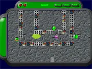 Screenshot of the puzzle game Monsters The Game showing colorful monsters near traps and the sticky green goo pit