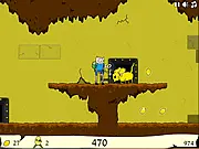 Gameplay screenshot of Lemon Break showing Finn the Human running through a level in the Lemon Kingdom, trying to free captive lemon citizens from cages.