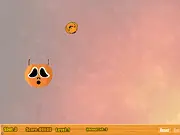 Screenshot of the Basketball Challenge Halloween Edition online game, showing a basketball being aimed toward a hoop in a spooky, haunted graveyard setting.