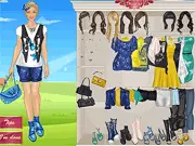 Screenshot of the free online Butterfly Beauty Dress Up game showing a girl modeling a cute butterfly-printed dress with stylish accessories and a chic hairstyle.