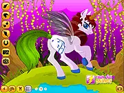 Screenshot of My Own Unicorn dress-up game, showing a fully customized unicorn with sparkling wings and a colorful mane.