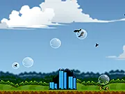 Peace Bubbles free online arcade defense game where you blow bubbles to catch bombs and airplanes