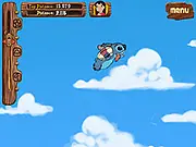 Stitch's Island Tour game screenshot showing Stitch flying high over a tropical Hawaiian island beach