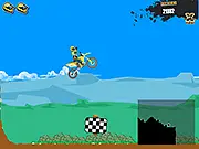 Motocross Racing 2 free online game showing a dirt bike rider performing a stunt jump over a canyon.