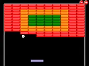 Ball The Box gameplay screenshot showing a paddle and a ball smashing colored boxes on a stage