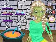 Screenshot of Elsa Zombie Makeover game showing a half-transformed Elsa, with one side of her face showing the zombie curse and the other side restored to her beautiful princess appearance