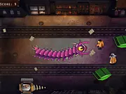 Screenshot of Crazy Alien Snake, a free online arcade game where a giant purple monster snake is destroying New York City and collecting weapons