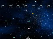 Space Fighter Czapeiro free online game screenshot of a spaceship shooting waves of enemies