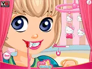 Screenshot of Hello Kitty Dental Crisis game showing a dentist treating a girl's teeth in a pink, Hello Kitty themed office