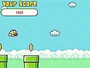 Screenshot of Flappy Bird World free online game showing a bird character flying between green pipe obstacles
