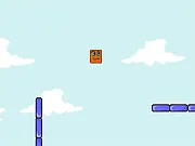 Screenshot of the Jumping Box 3 physics puzzle game showing a square box being flung over spikes to land on a platform near the flag.