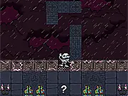 Gameplay screenshot from Numbskull, an online rotation puzzle game showing a skull head rolling across a segmented piece of ground that can be rotated.