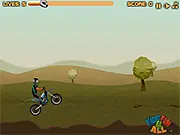 Dirt Bike Classic free online stunt game screenshot, dirt bike rider performing a jump over obstacles on a scenic forest track