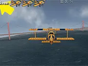 3D Stunt Pilot San Francisco free online game screenshot showing a stunt plane flying through an obstacle ring above the city