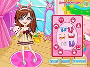 Easter Dressup game screen showing Naomi, a girl with a cute dress and makeup, posing with her favorite bunny co-star for her Easter theatre play