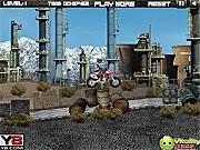 Industrial Site Motocross Stunts game screenshot, a dirt bike performing a jump over obstacles at an industrial construction site, free online stunt game