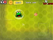 Frog Jump Jump game screenshot, a small frog jumping on platforms to reach candy, free online arcade game